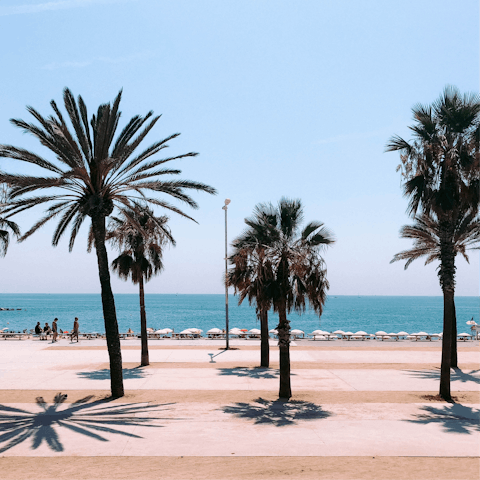 Grab your beach towel and head to Barceloneta Beach, just over a fifteen-minute walk