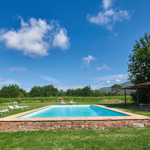 Ride the golf buggy down to the private pool for a relaxing afternoon