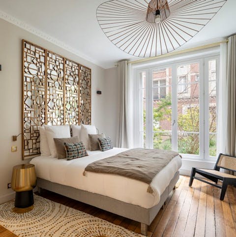 Wake up feeling refreshed in this elegant Parisian apartment