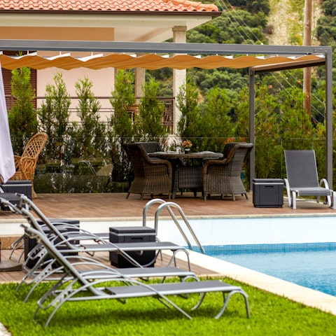 Unwind in the sun by the pool