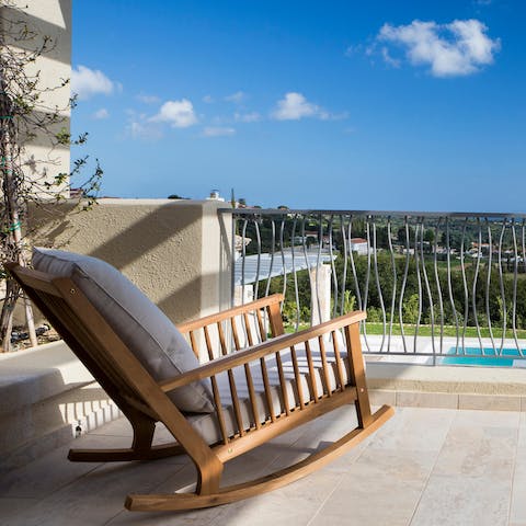Relax on the terrace balcony while taking in the breathtaking views over the Ionian Sea