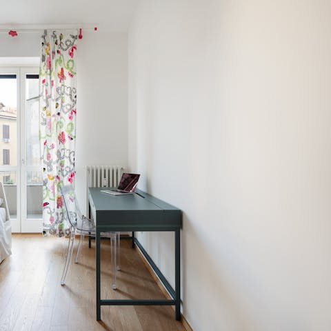 Catch up on emails with the balcony doors open