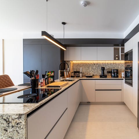 Rustle up tasty tapas in the sleek kitchen