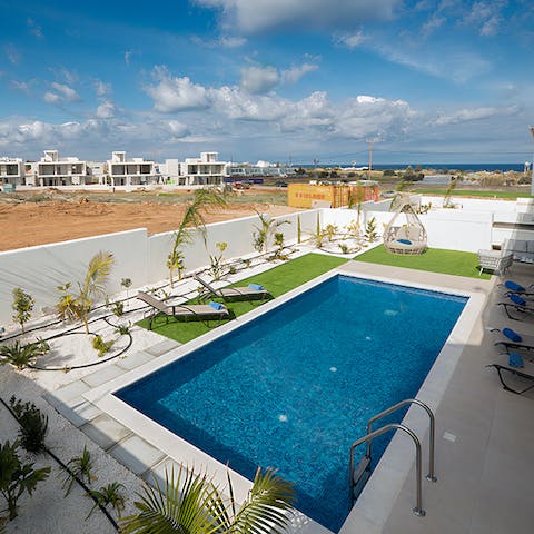 Chill out by the pool after a quick trip to Ayia Napa
