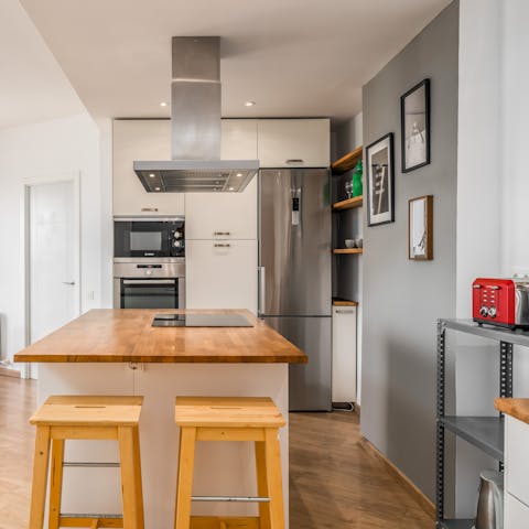 Whip up homemade tapas dishes in the sleek kitchen