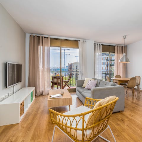 Kick back in the bright living room after a busy day of touring the city