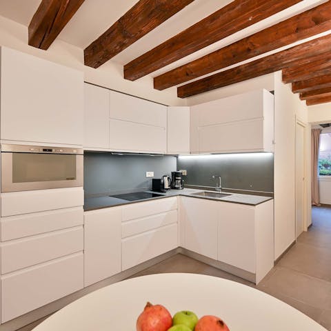Prepare meals or snacks in the convenient kitchen