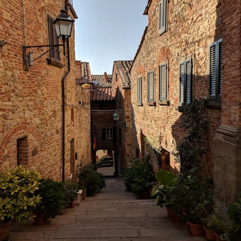 Walk the storied streets of nearby Lucignano