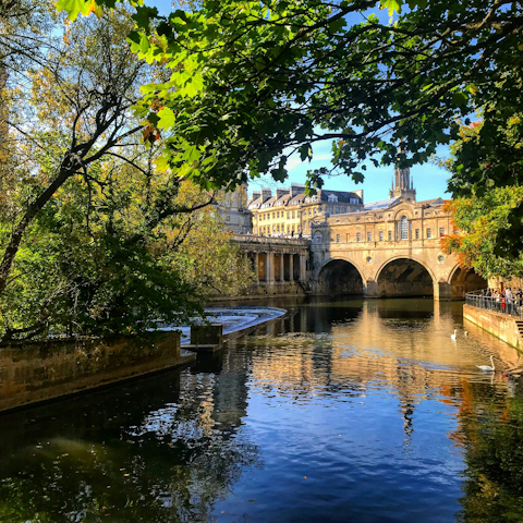 Discover Pulteney Bridge, an eight-minute walk away