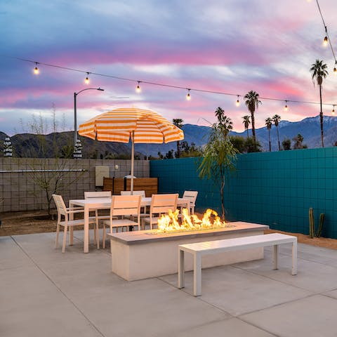 Dig into alfresco burgers and gather round the fire pit on a warm evening