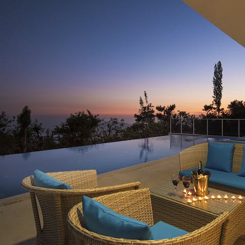 End your day with a glass of wine as the sun sets on the horizon