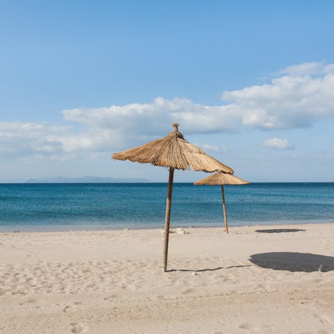 Go for a refreshing dip at Glyfada Beach, 400 metres away