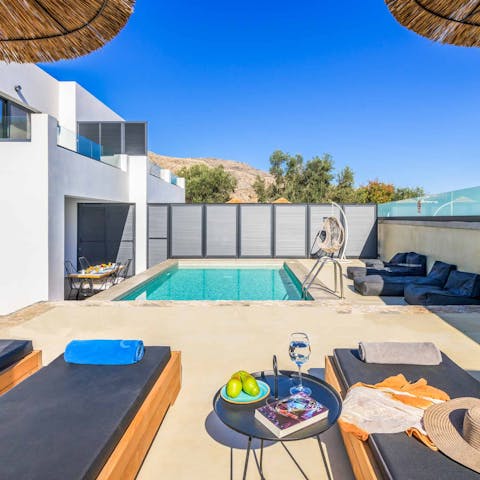 Spend slow days drifting between the pool and a sun lounger
