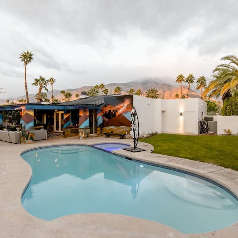 Take a pre-dinner dip in the pool or admire the dramatic mountain views from a sun lounger