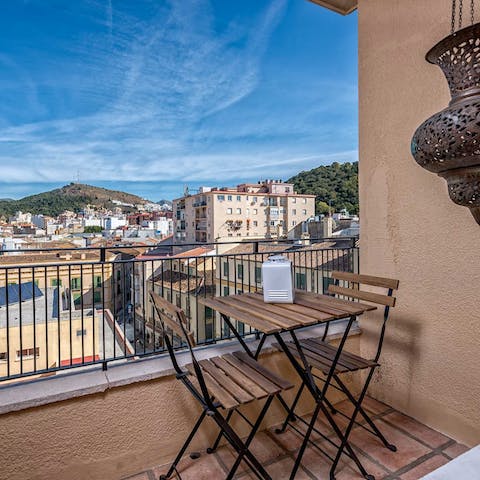 Treat yourself to a tipple on the private terrace before heading out to explore the city