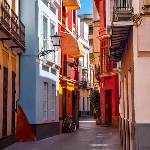 Explore the colourful streets of Seville on foot