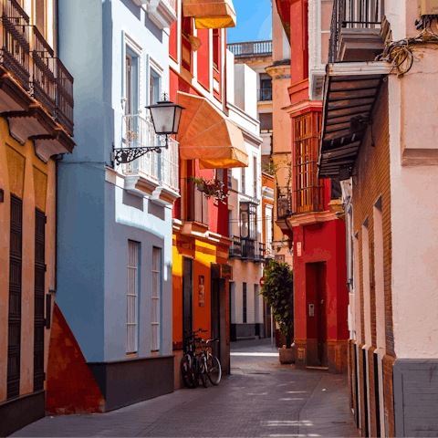 Explore the colourful streets of Seville on foot