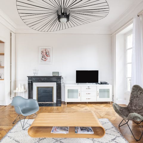 Relax together in the chic,  light-filled sitting room