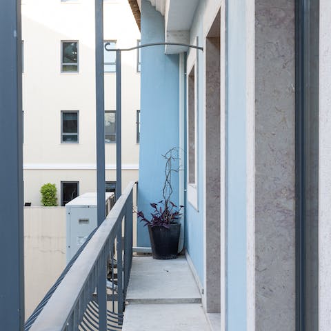 Get some fresh air on the balcony