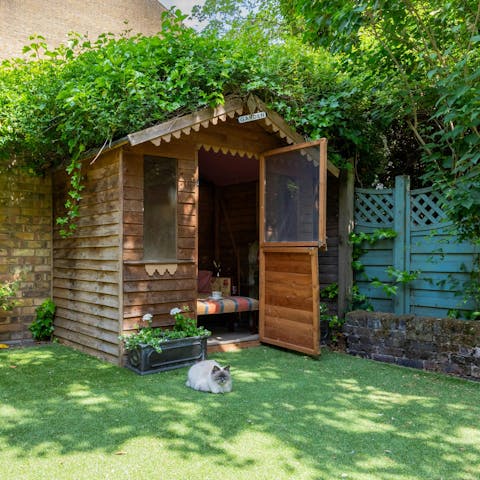 Cosy up in this garden nook with a book (cat not included)
