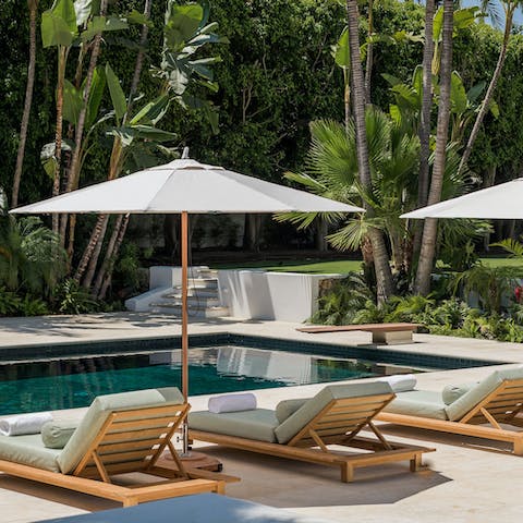 Luxuriate in a haven of peace from the poolside day beds