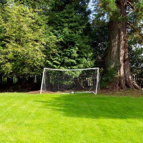 Bring your kit and have a game of football on the grassy lawn