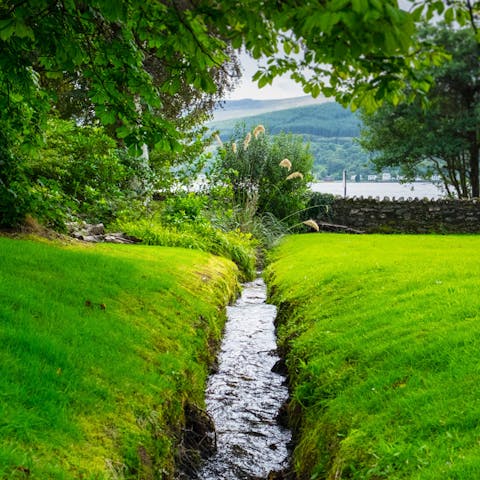 Soak up the views of Holy Loch from the lush garden