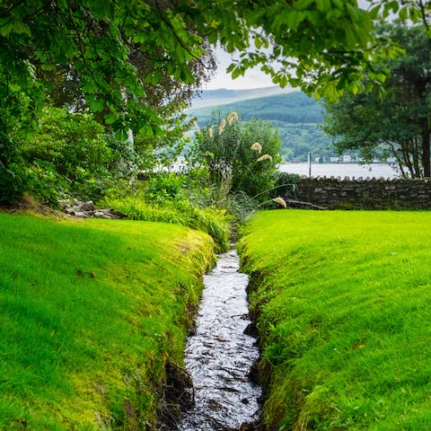 Soak up the views of Holy Loch from the lush garden