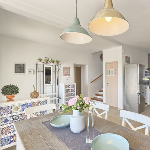 Plan your outings in a well-lit living space while sharing a traditional breakfast