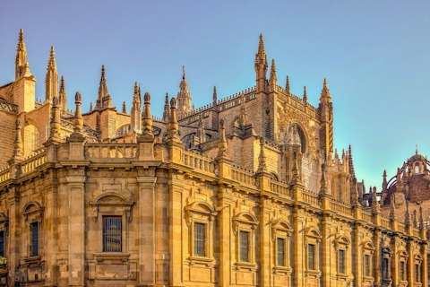 Visit Seville Cathedral, just a six-minute walk away