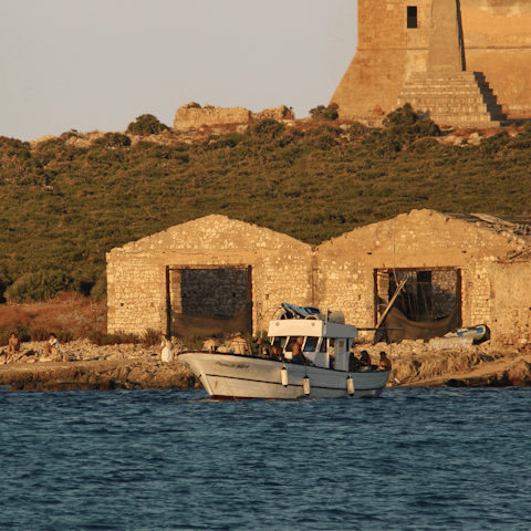Take a half hour drive to Capo Rossero, Sicily's southernmost point