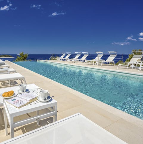 Swim some lengths of the shared outdoor pool while you gaze out at ocean views