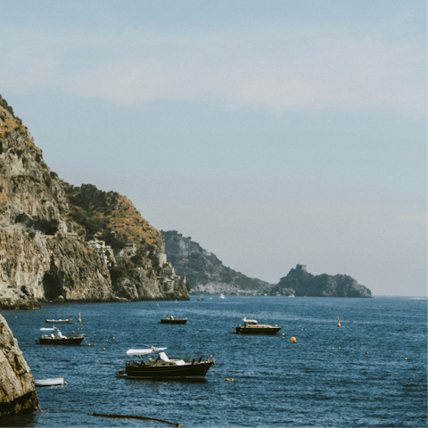 Take a boat trip along the stunning coastline of Praiano