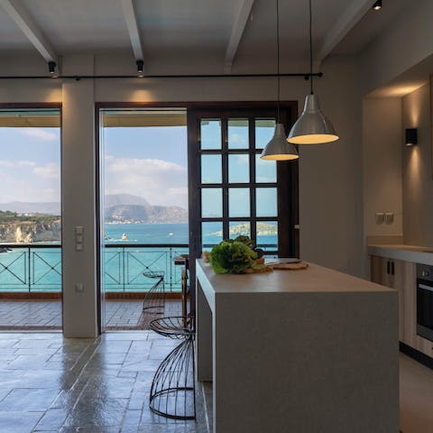Rustle up your favourite dishes as you look out to the Aegean