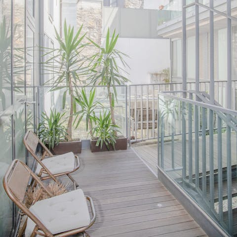 Sip your morning coffee on the communal front balcony