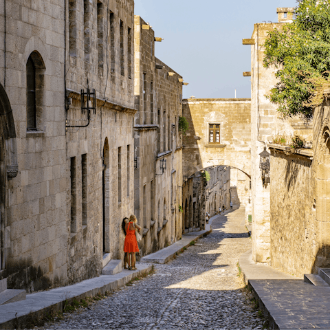 Visit the piazzas and Byzantine-era mosques in  Rhodes' old town