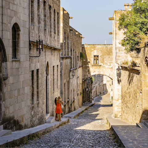 Visit the piazzas and Byzantine-era mosques in Rhodes' old town
