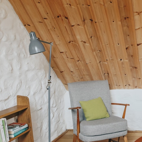 Light the fire, put on a record and enjoy cosy nights in this special home