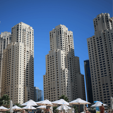 Relax on the soft sands of the famous JBR beach