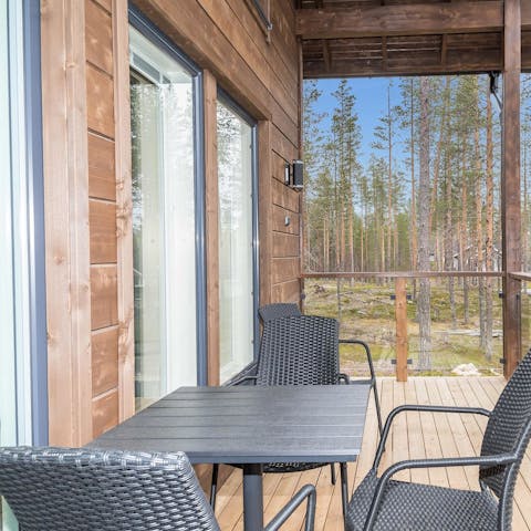 Enjoy the long summer nights on the home's terrace