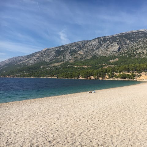 Pack your beach towel and sun cream and spend the day at the sandy beach of Soline Beach, lined by bars and cafes