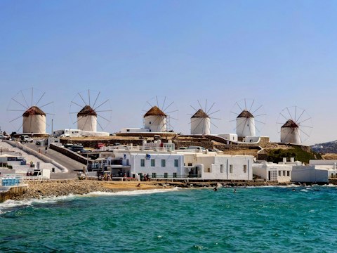 Admire the Mykonos Windmills, roughly a fourteen-minute drive away