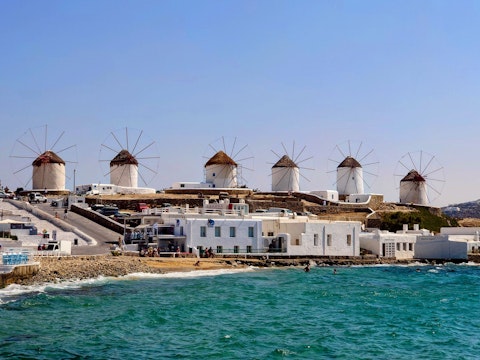 Admire the Mykonos Windmills, roughly a fourteen-minute drive away