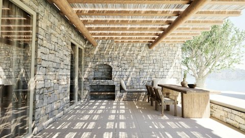 Dine alfresco beneath the timber pergola on the sun-warmed terrace