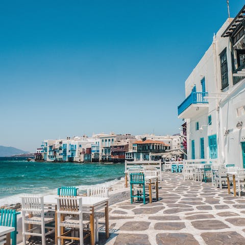 Make the ten-minute drive (or leisurely boat trip) to buzzing Mykonos Town