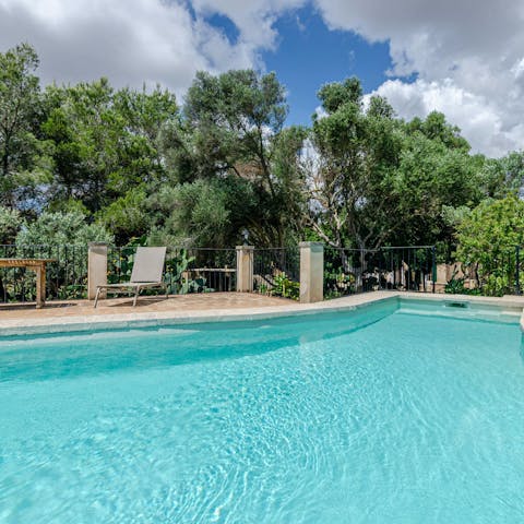 Plunge into the private pool and float about in the cool water