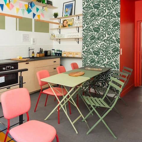 Come together for your morning croissants in the palm-themed dining area