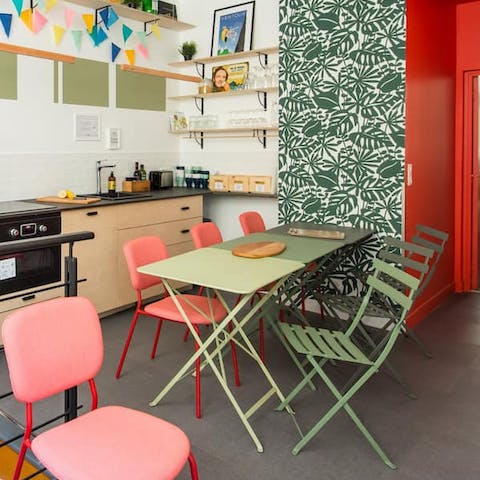 Come together for your morning croissants in the palm-themed dining area