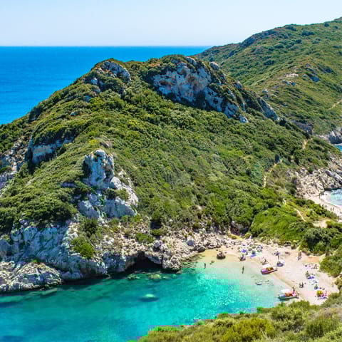 Take a boat trip to nearby Porto Timoni