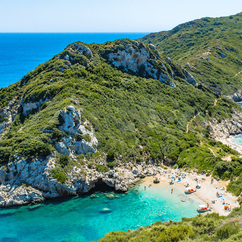 Take a boat trip to nearby Porto Timoni